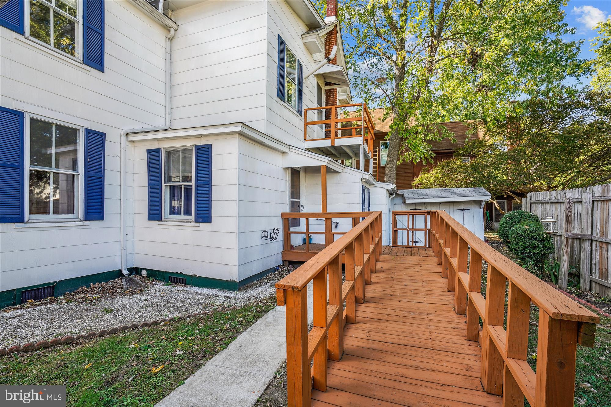 817 Locust Street Cambridge, MD 21613 - Photo 31 of 44 a view of a house with wooden deck