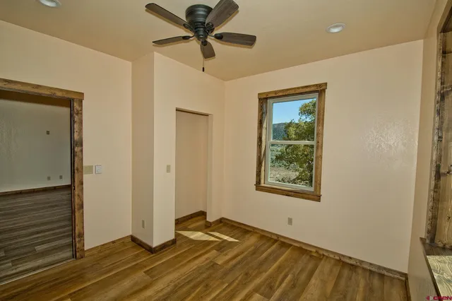 a view of an empty room and window