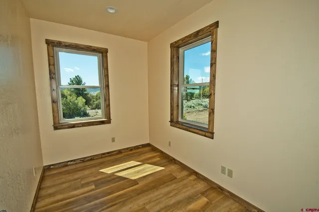 a view of a room that has a window in it