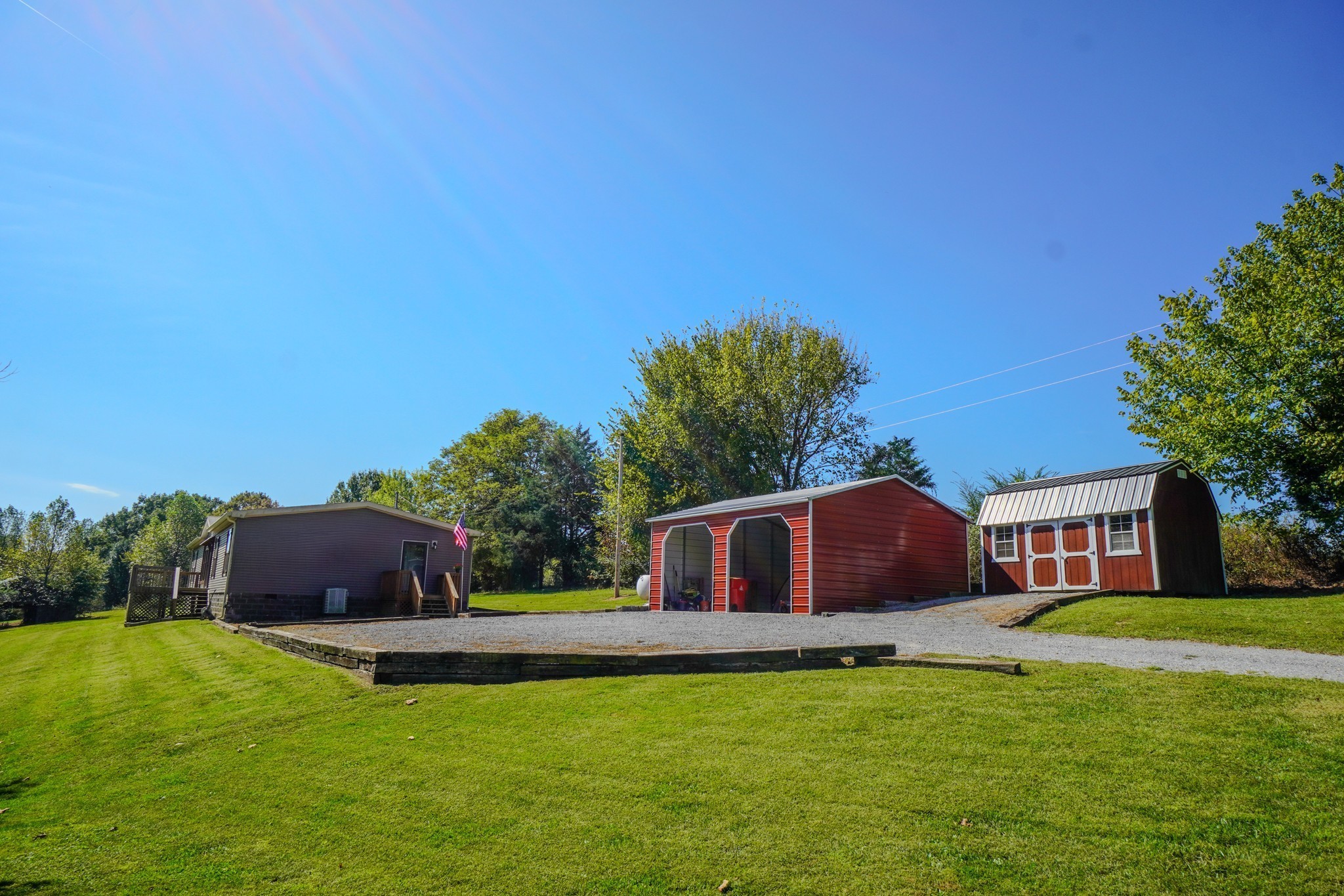 137 Hawkins Road Westmoreland, TN 37186 - Photo 11 of 71 a front view of house with yard and outdoor seating