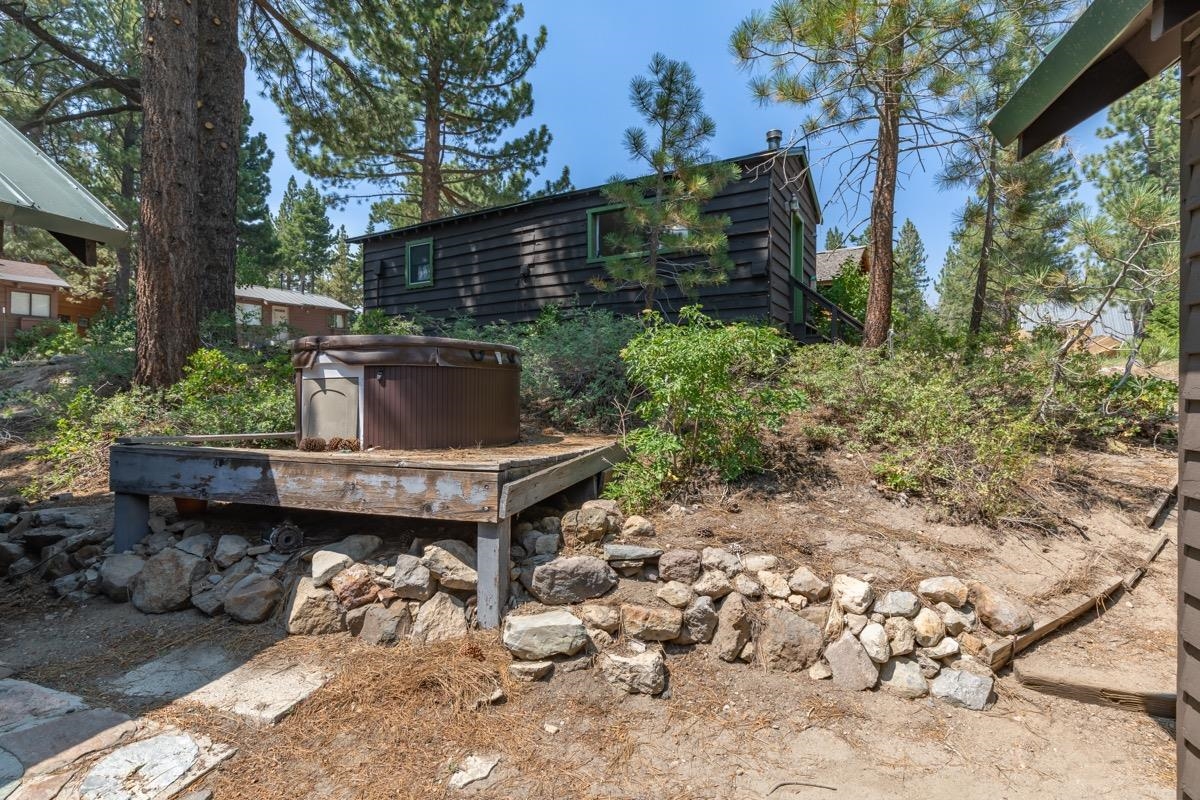 2030 Old Mammoth Road Mammoth Lakes, CA 93546 - Photo 44 of 46 a view of a chairs and table in the backyard