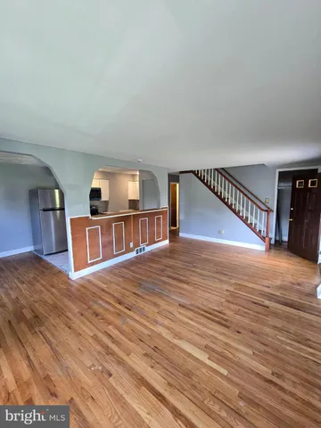 a view of a livingroom with an empty room