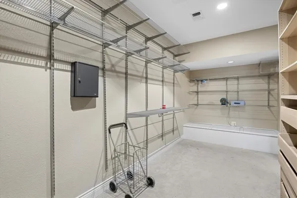 a bathroom with a tub and shower