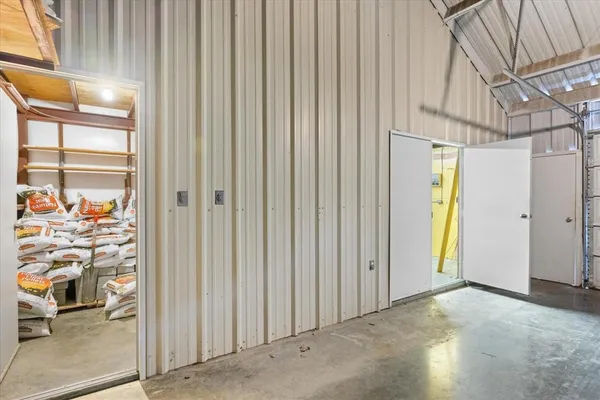 a view of a room with wooden walls