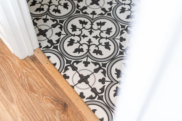 a bedroom with a bed and a desk