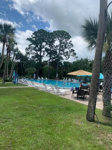 a view of outdoor space yard deck patio and swimming pool
