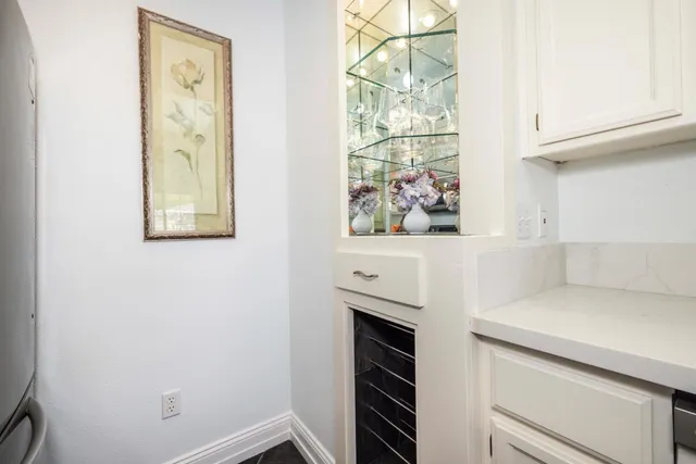 a kitchen with a sink stove and microwave