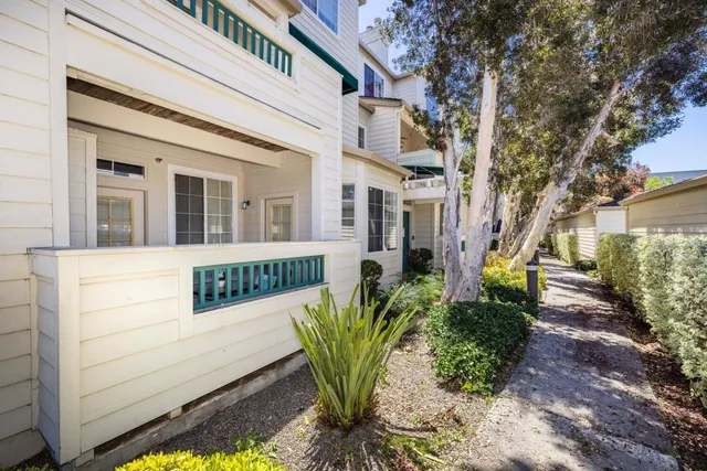 a front view of a house with swimming pool