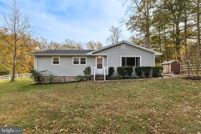a house view with a garden space