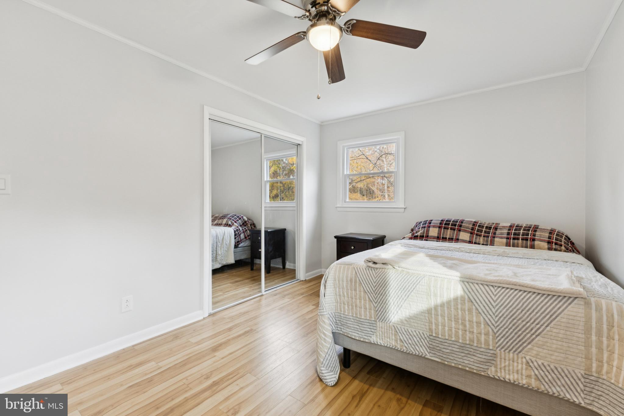 24530 Hollywood Road Hollywood, MD 20636 - Photo 20 of 40 a bedroom with a bed and a table