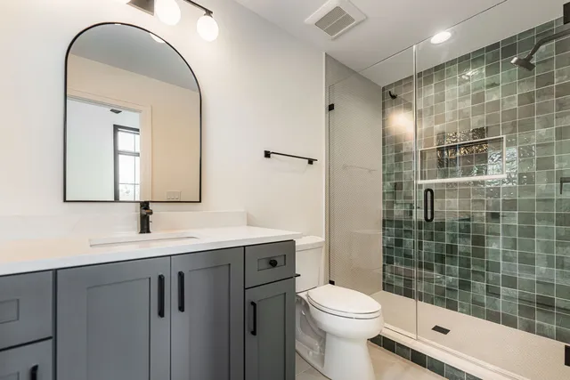 a kitchen with a sink and wooden cabinets