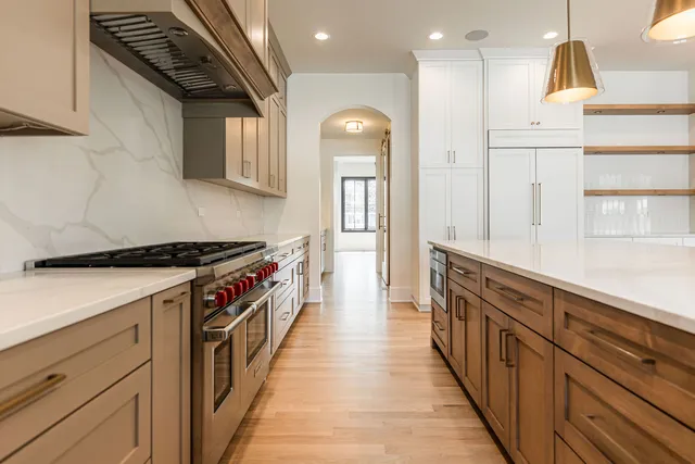 a view of an entryway with wooden floor and windows