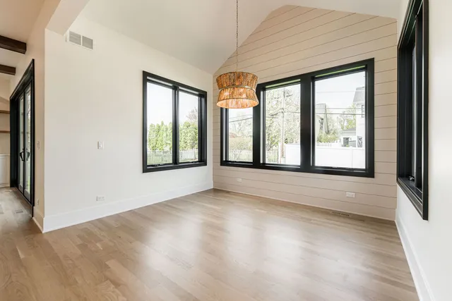 a view of cabinets with wooden floor