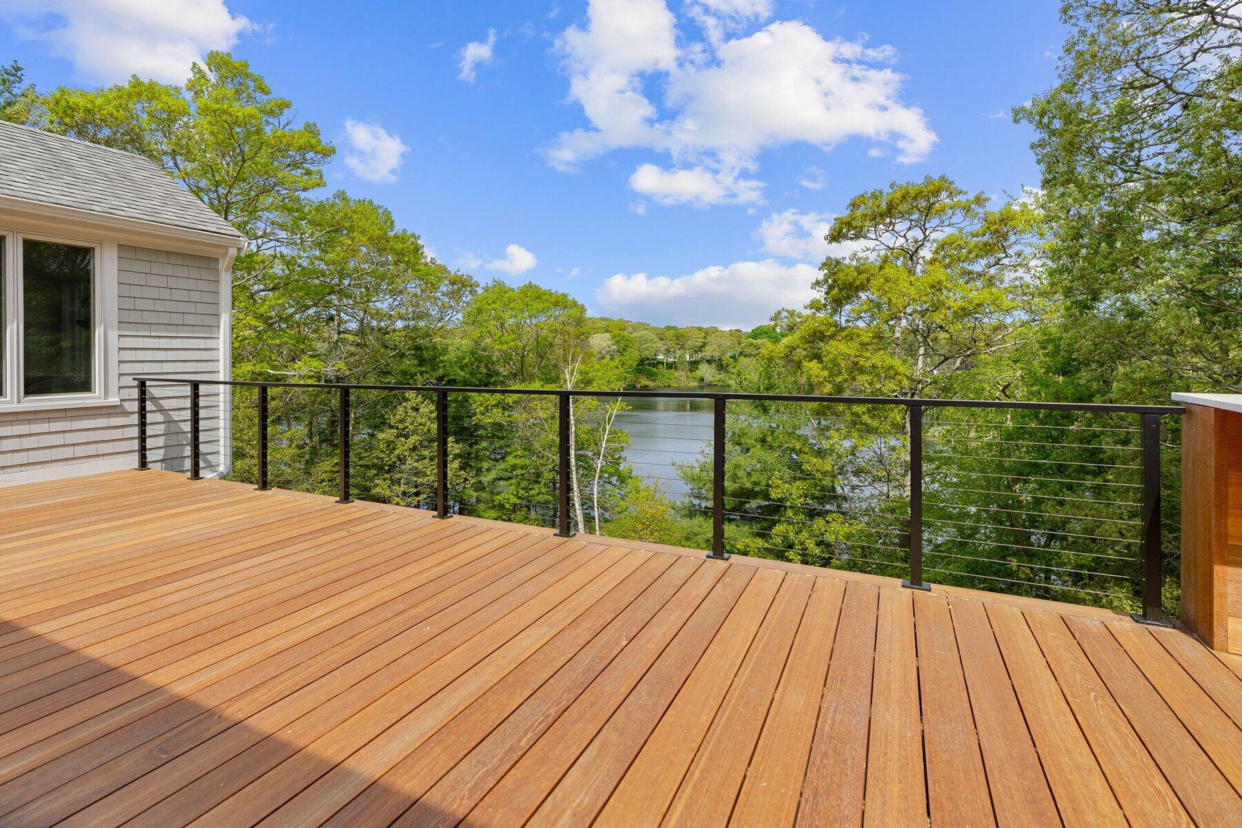 162 Main Street Osterville, MA 02655 - Photo 13 of 50 a balcony with wooden floor