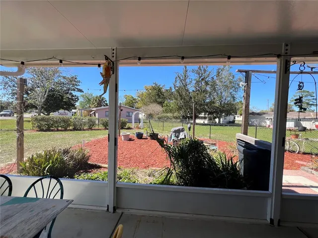 a view of a patio with swimming pool