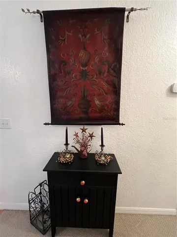 a view of a balcony with chairs and wooden floor