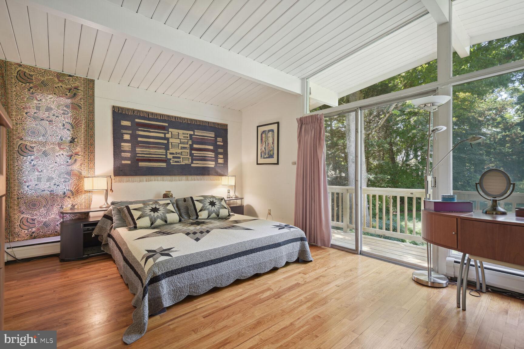 6765 Brigadoon Drive Bethesda, MD 20817 - Photo 14 of 30 2nd level primary suite with balcony