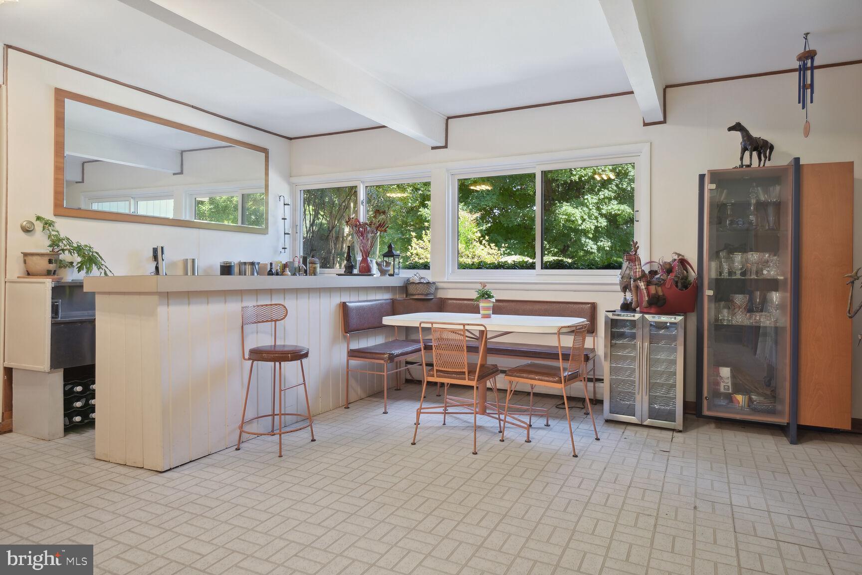 6765 Brigadoon Drive Bethesda, MD 20817 - Photo 20 of 30 Oversized recreation/party room with bar