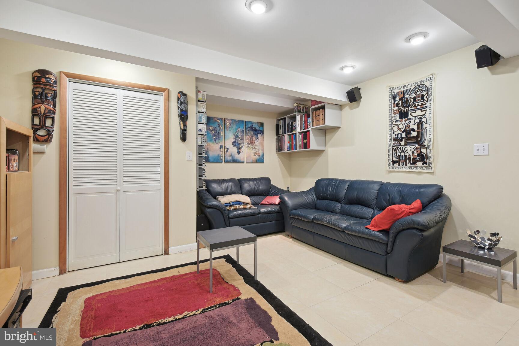 6765 Brigadoon Drive Bethesda, MD 20817 - Photo 25 of 30 Lower level den/media room