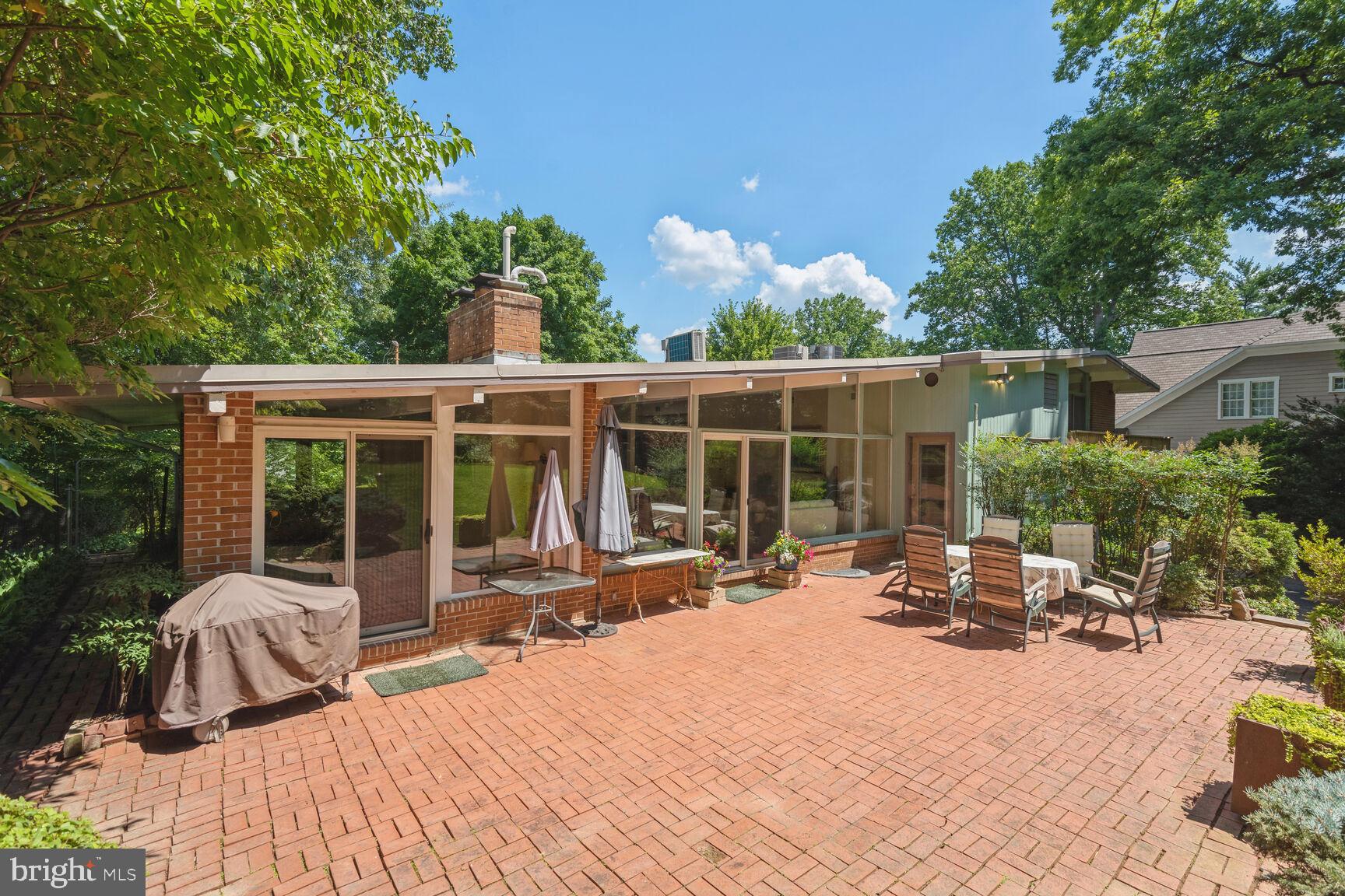 6765 Brigadoon Drive Bethesda, MD 20817 - Photo 28 of 30 Brick patio in backyard
