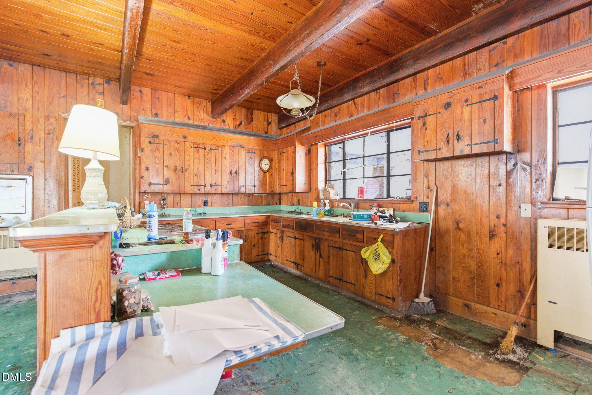 1603 Sykes Road Mebane, NC 27302 - Photo 12 of 45 a room with lot of frames on wall and a large window