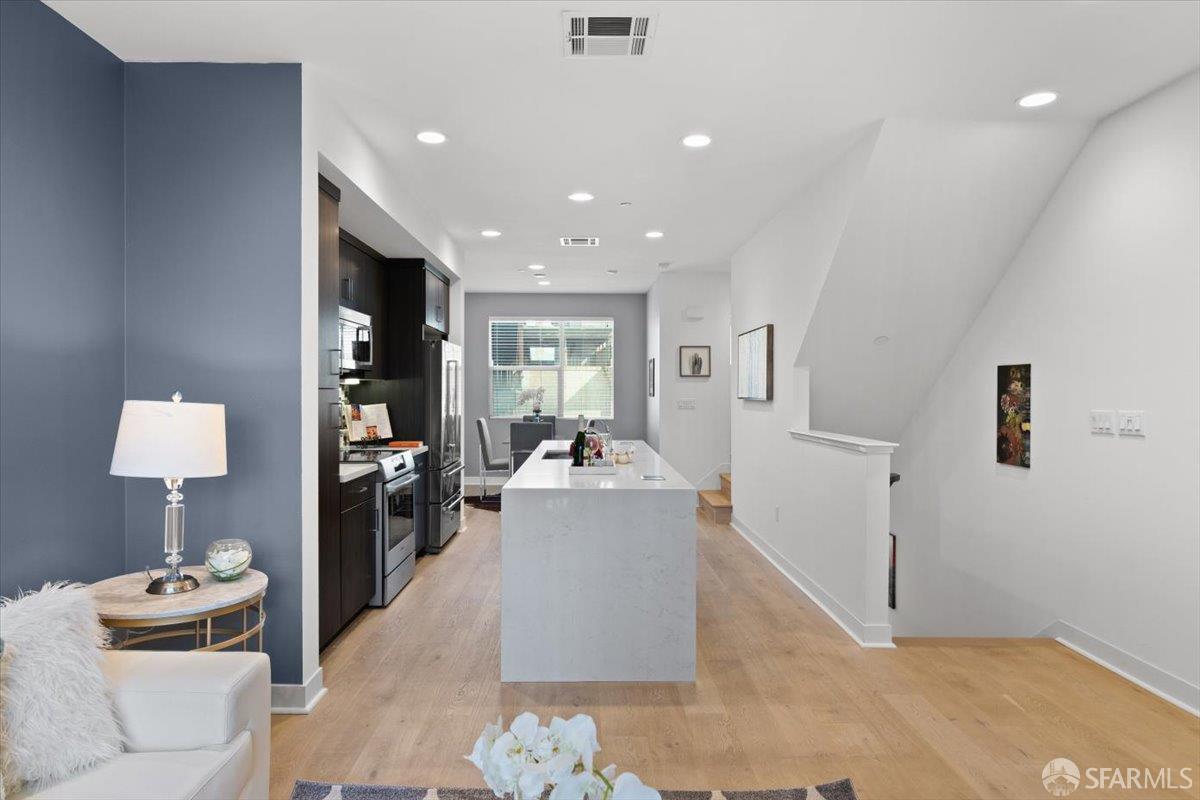 1807 16th Street Oakland, CA 94607 - Photo 6 of 45 a living room with furniture and a table