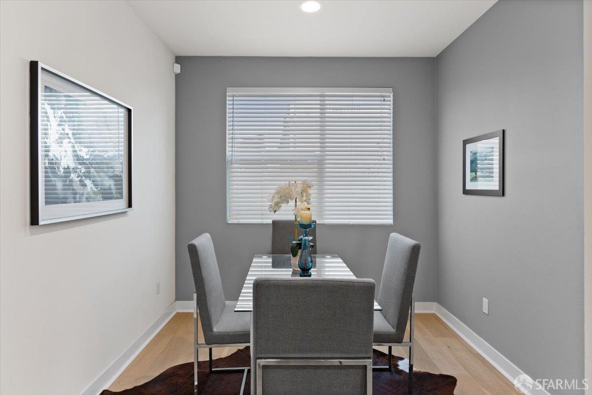1807 16th Street Oakland, CA 94607 - Photo 10 of 45 a dining room with furniture and window