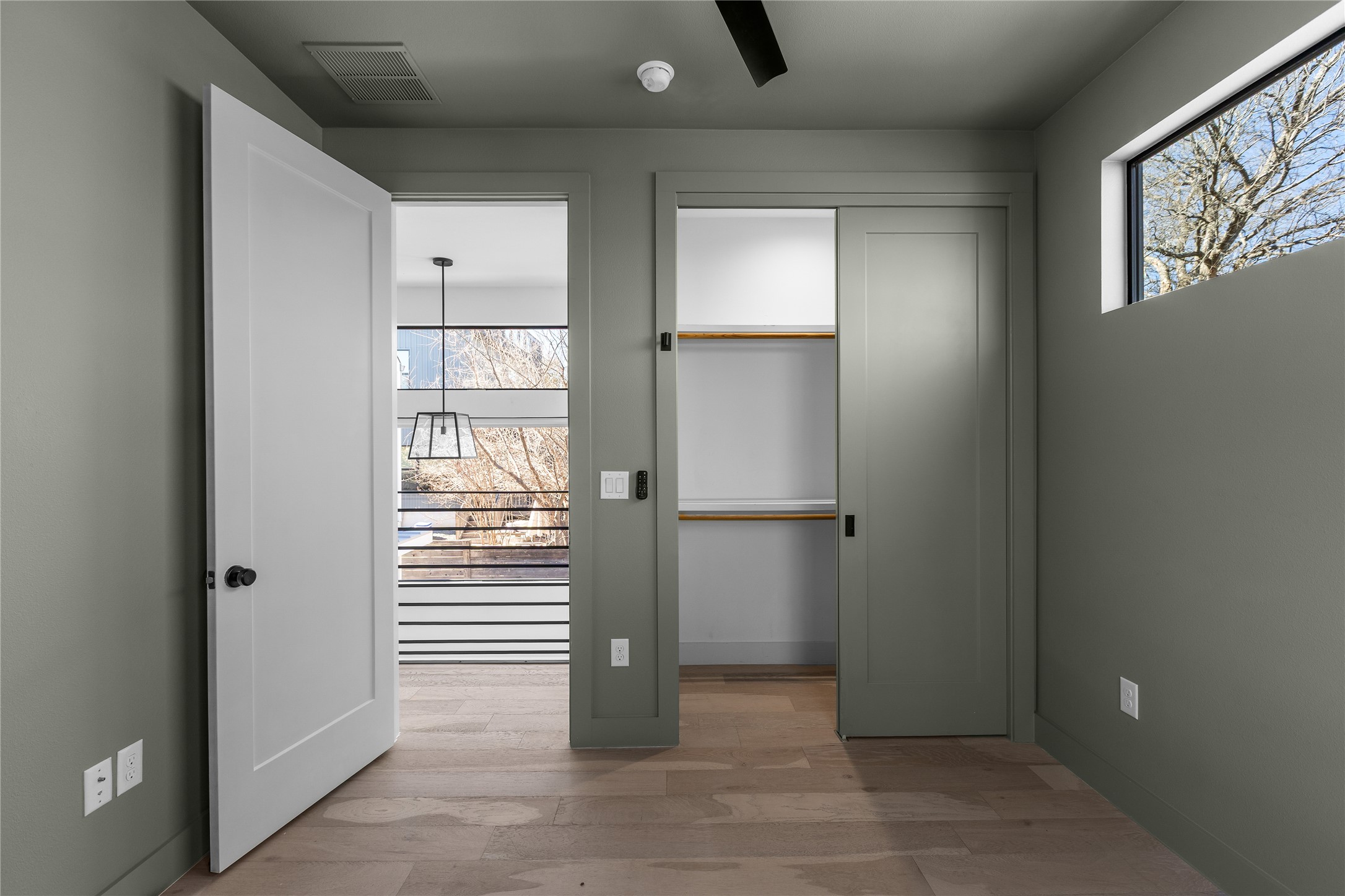 2804 East 22nd Street, Unit B Austin, TX 78722 - Photo 19 of 40 an empty room with windows and closet