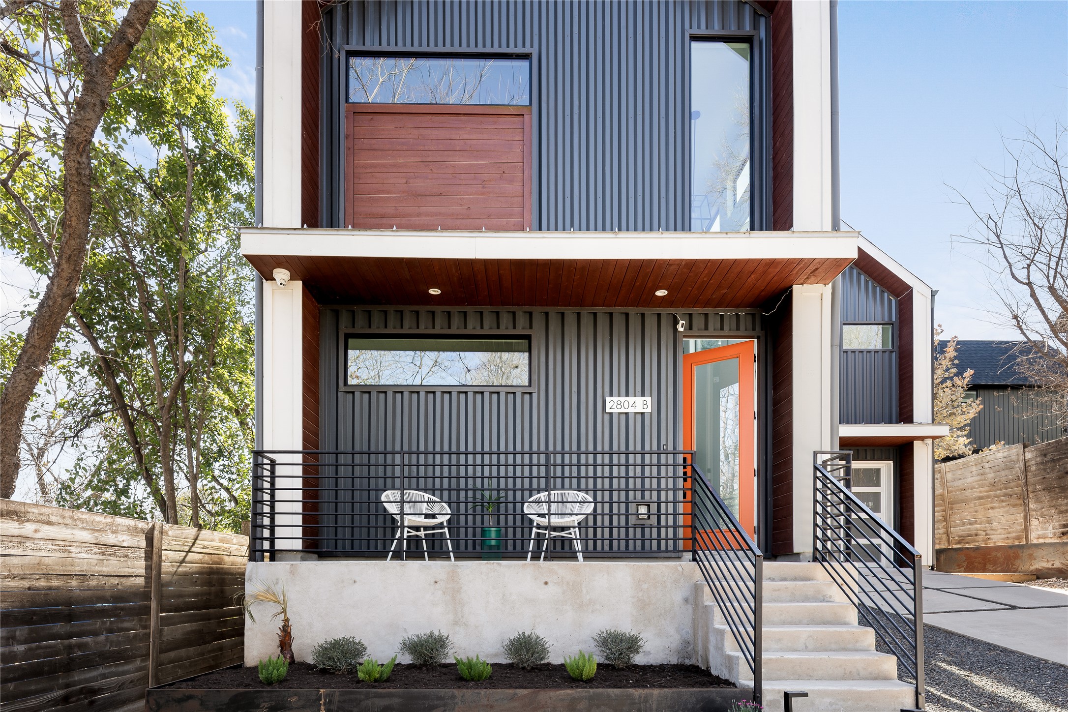 2804 East 22nd Street, Unit B Austin, TX 78722 - Photo 24 of 40 Front of home with driveway, front porch, & private yard