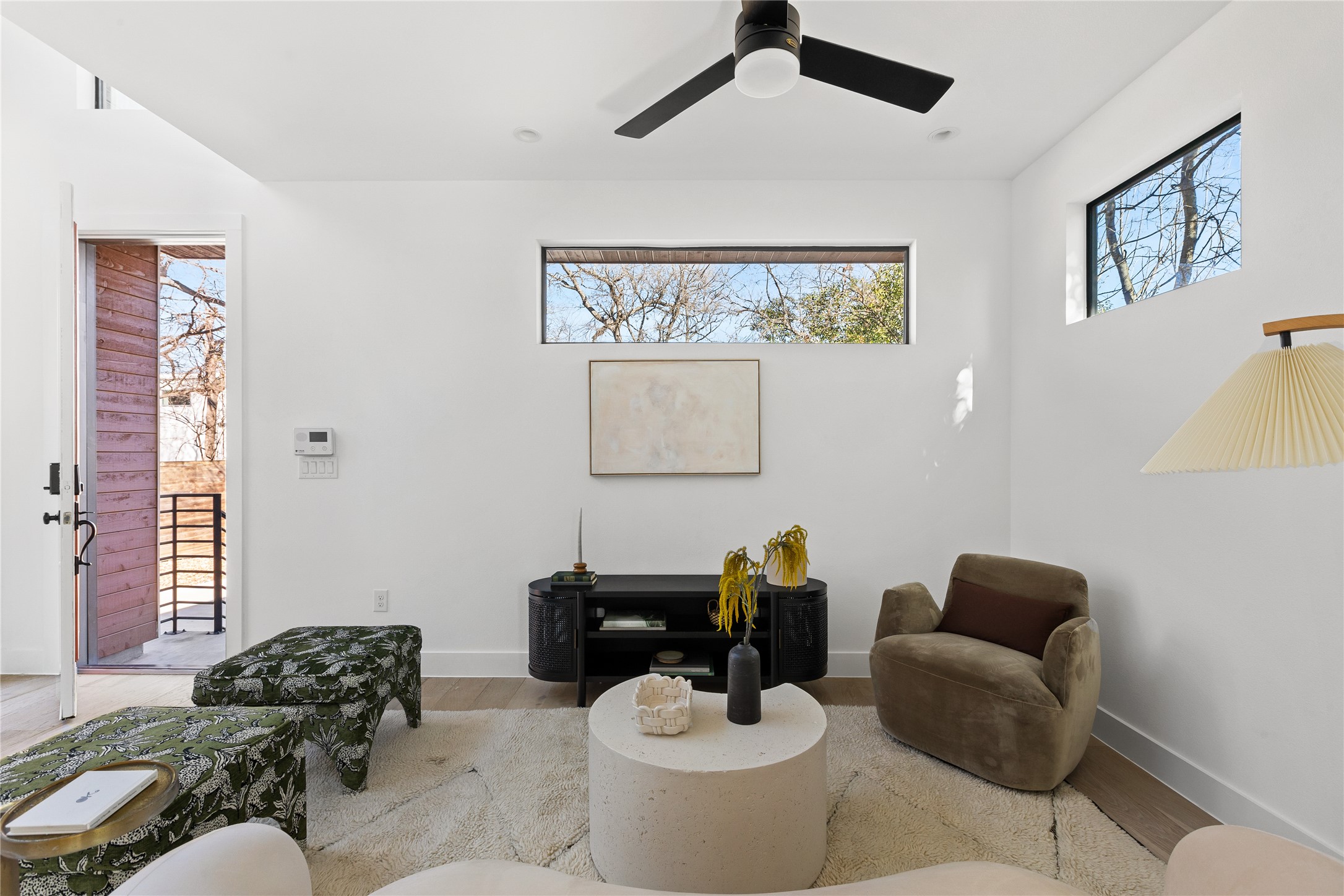 2804 East 22nd Street, Unit B Austin, TX 78722 - Photo 26 of 40 a living room with furniture and a large window