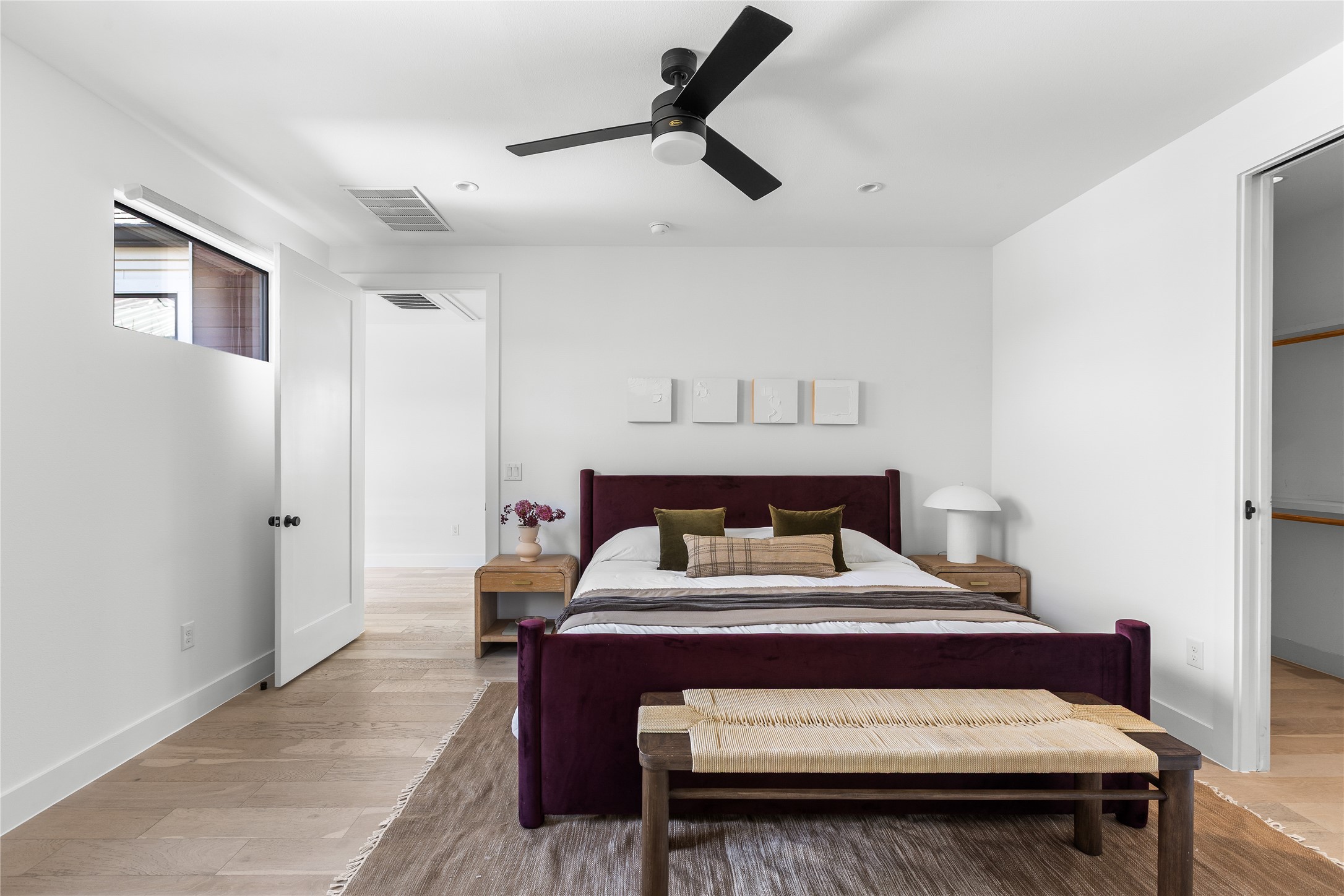 2804 East 22nd Street, Unit B Austin, TX 78722 - Photo 28 of 40 a bedroom with a bed and a dresser