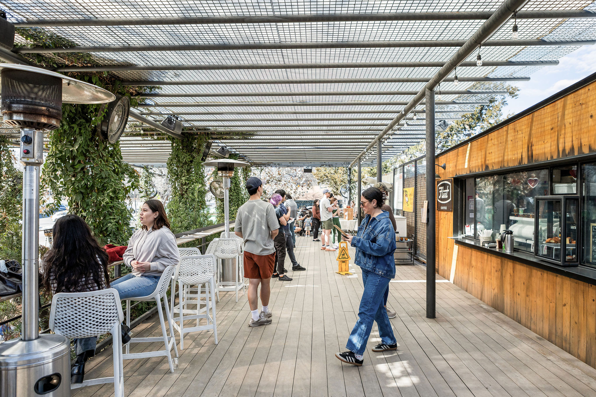 2804 East 22nd Street, Unit B Austin, TX 78722 - Photo 33 of 40 a view of a porch with furniture and wooden floor