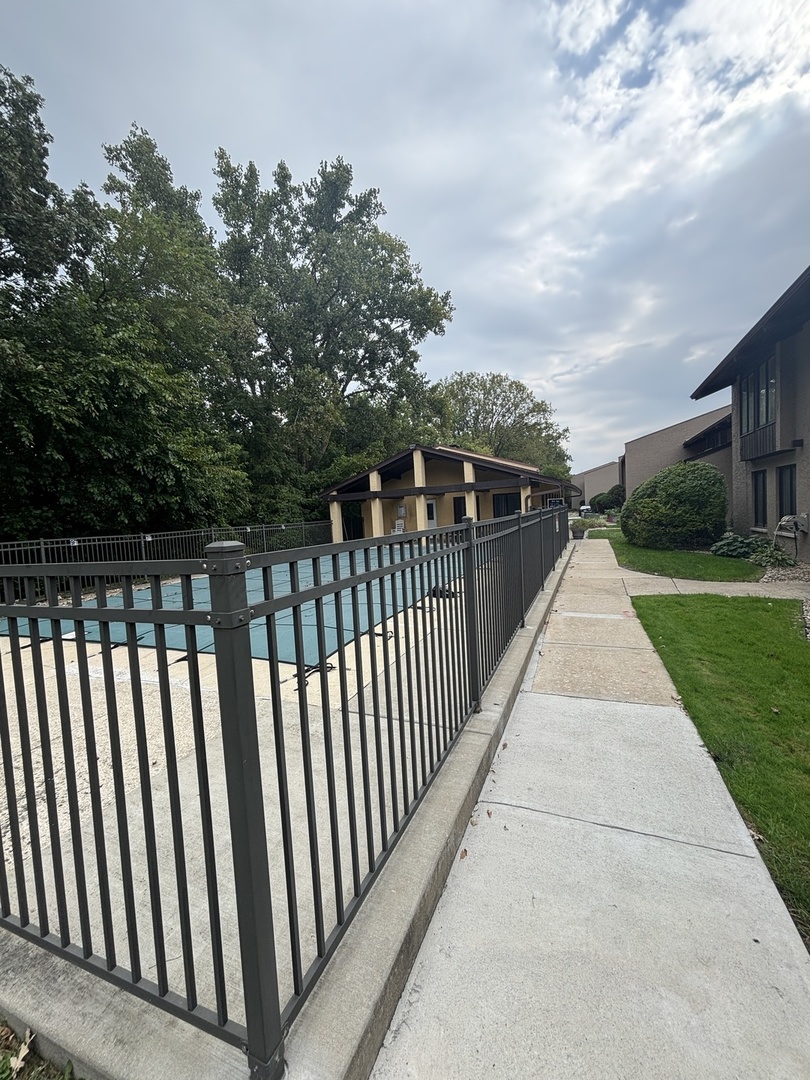 1050 Holbrook Road, Unit 1H Homewood, IL 60430 - Photo 2 of 10 a view of a park with large trees
