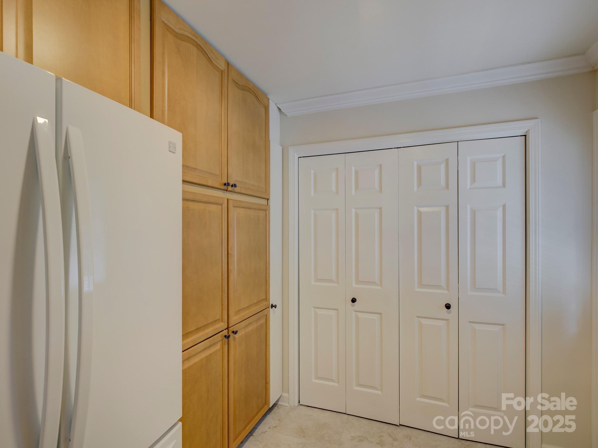 1340 Braeburn Road Charlotte, NC 28211 - Photo 17 of 46 a view of a refrigerator in kitchen