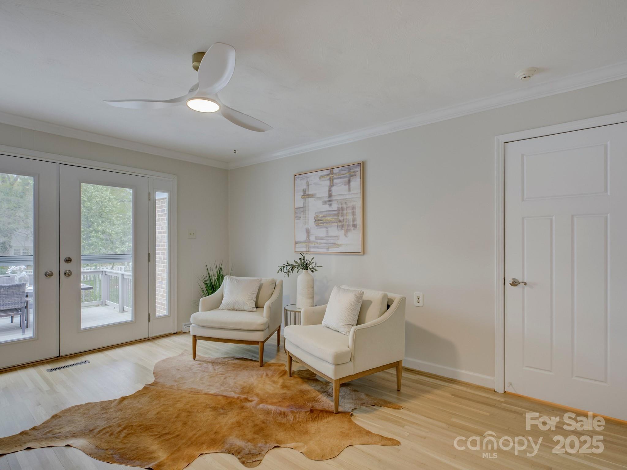 1340 Braeburn Road Charlotte, NC 28211 - Photo 19 of 46 a living room with furniture and wooden floor