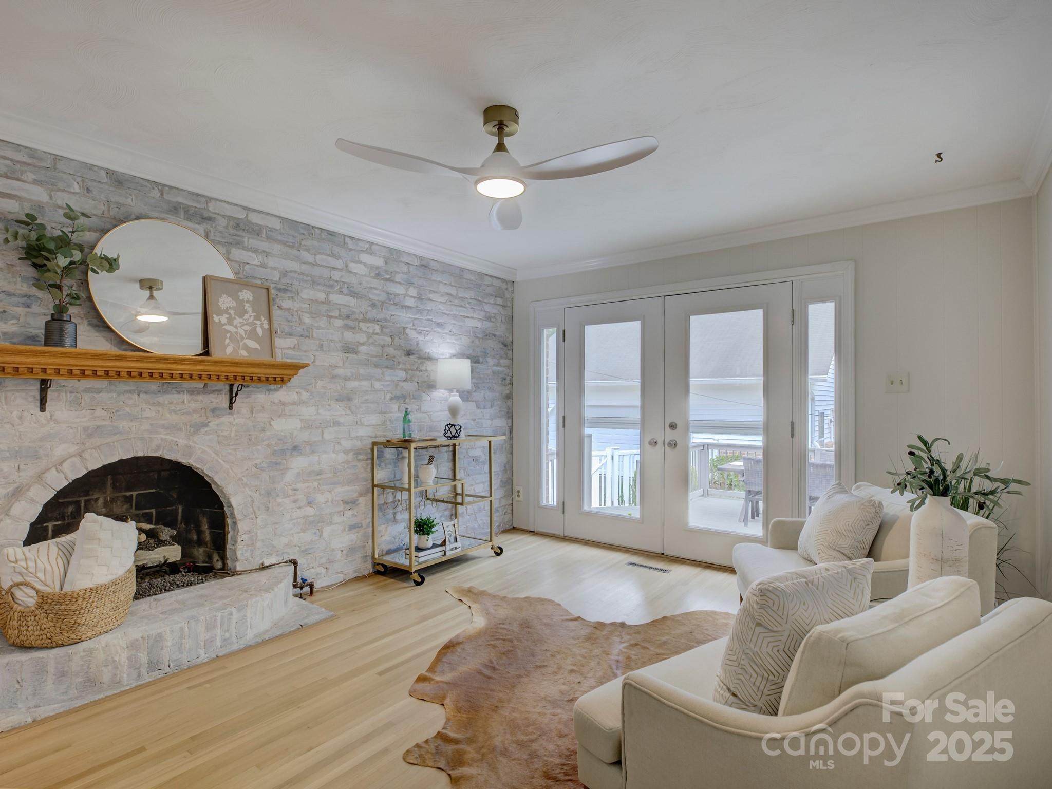1340 Braeburn Road Charlotte, NC 28211 - Photo 20 of 46 a living room with furniture and a fireplace