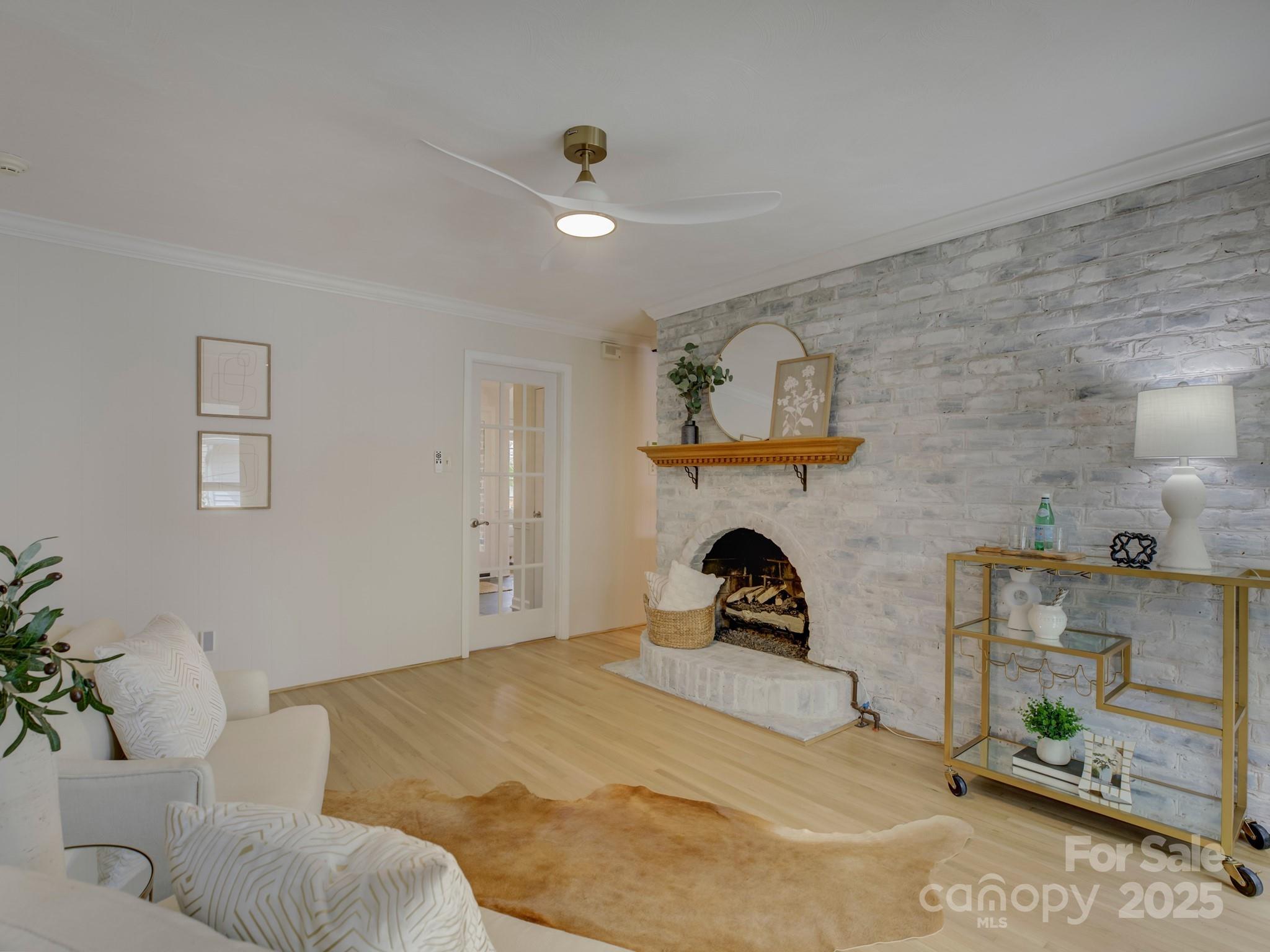 1340 Braeburn Road Charlotte, NC 28211 - Photo 21 of 46 a bedroom with a bed and a couch