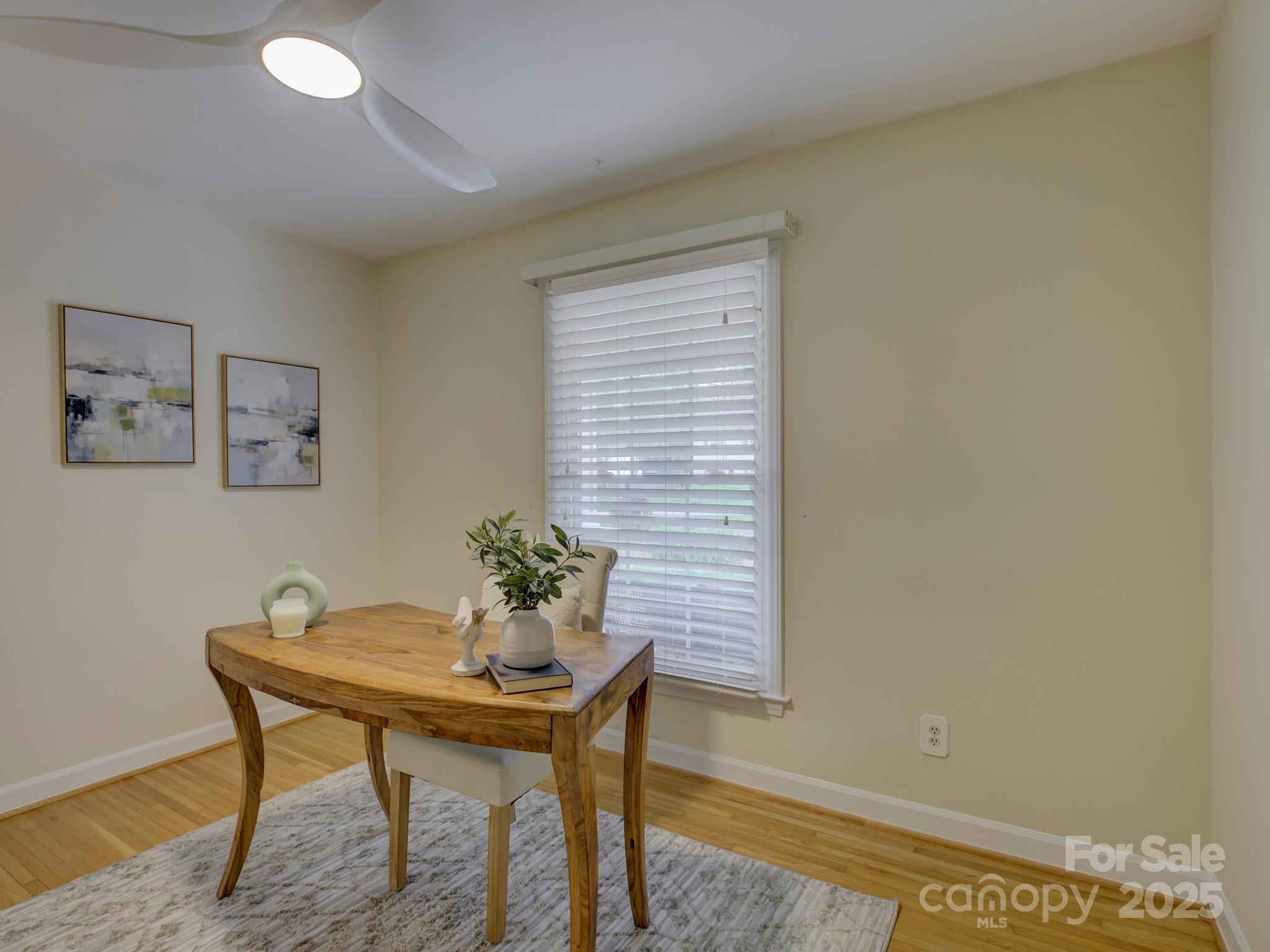 1340 Braeburn Road Charlotte, NC 28211 - Photo 23 of 46 a view of a workspace with furniture