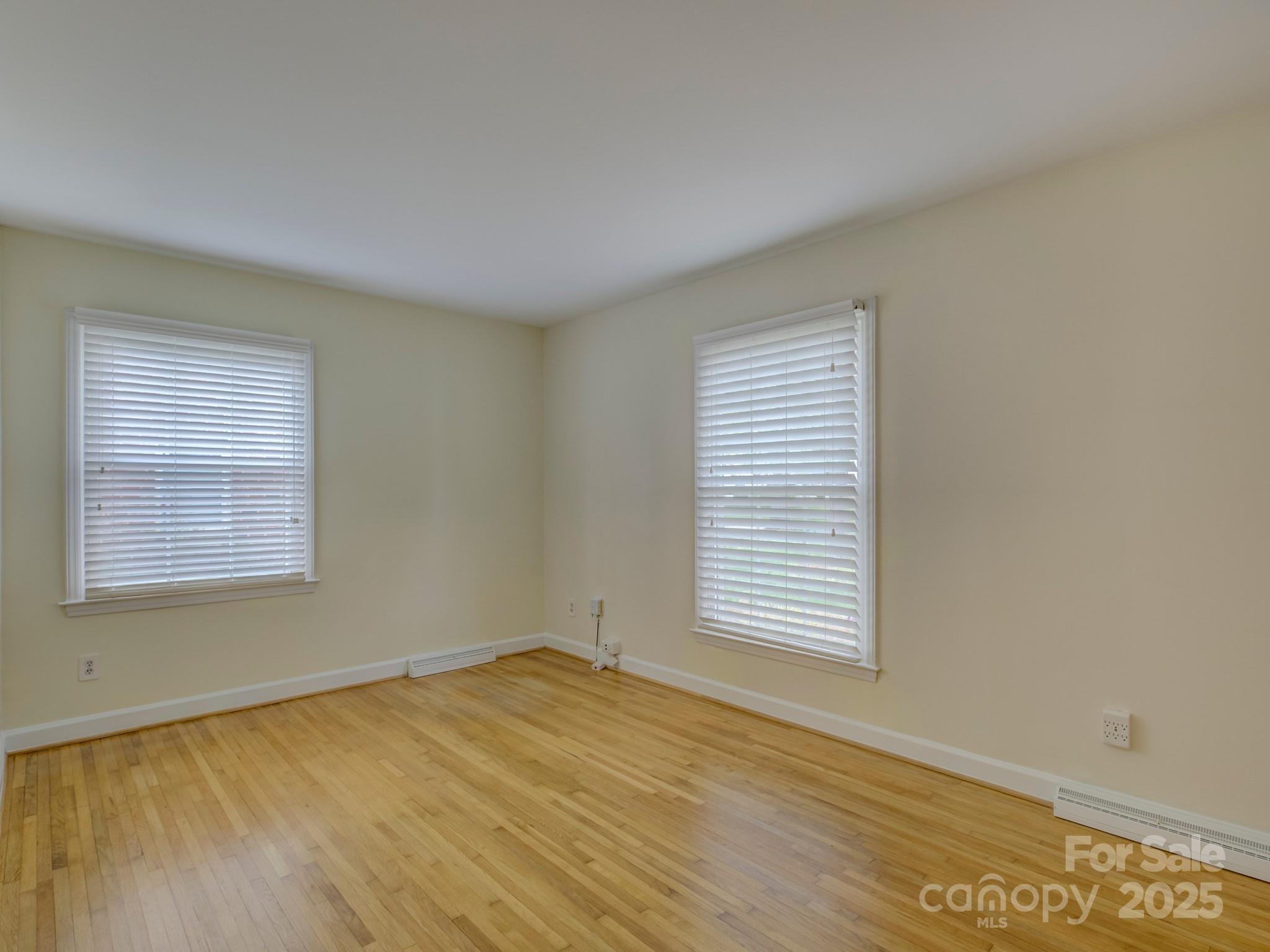 1340 Braeburn Road Charlotte, NC 28211 - Photo 27 of 46 a view of an empty room with a window