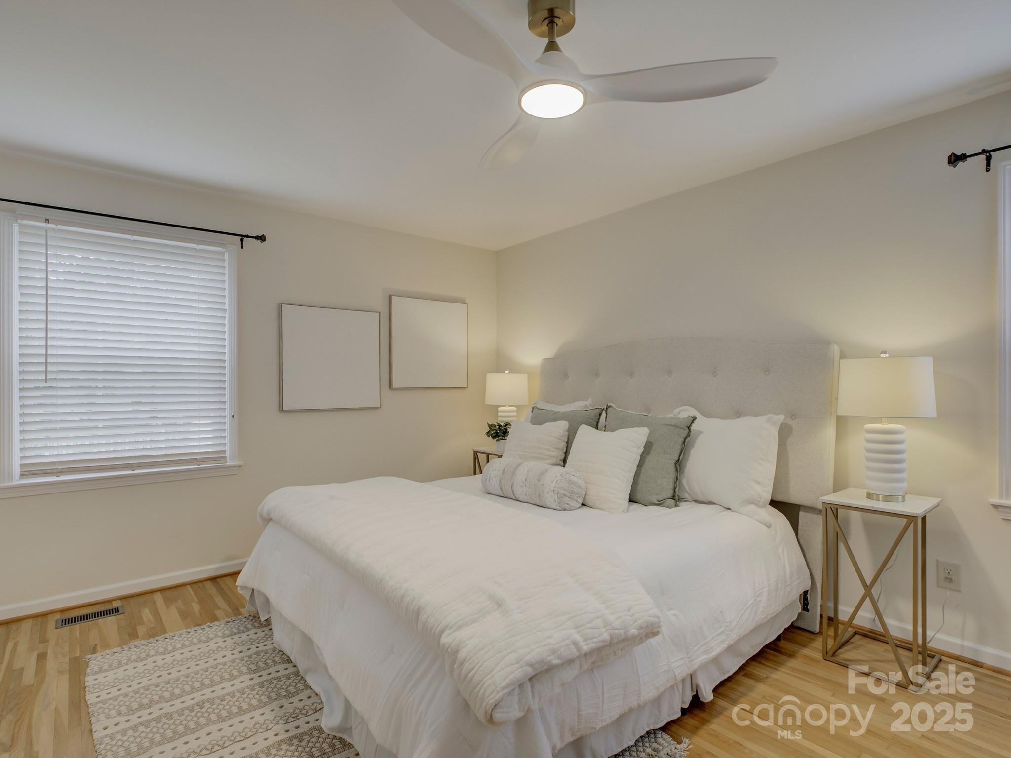 1340 Braeburn Road Charlotte, NC 28211 - Photo 30 of 46 a bedroom with a bed and a window