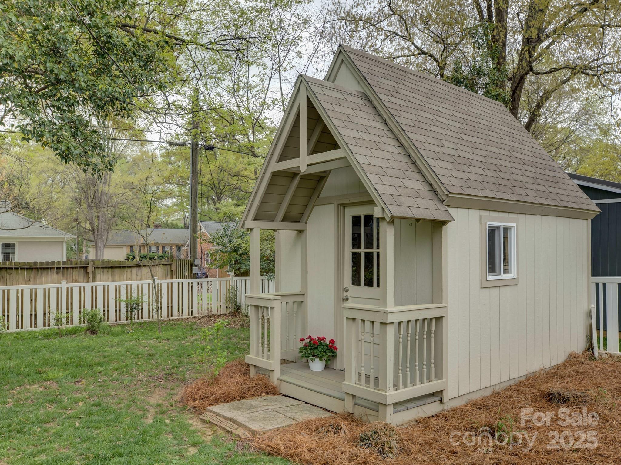 1340 Braeburn Road Charlotte, NC 28211 - Photo 39 of 46 a view of a house with a yard and wooden fence