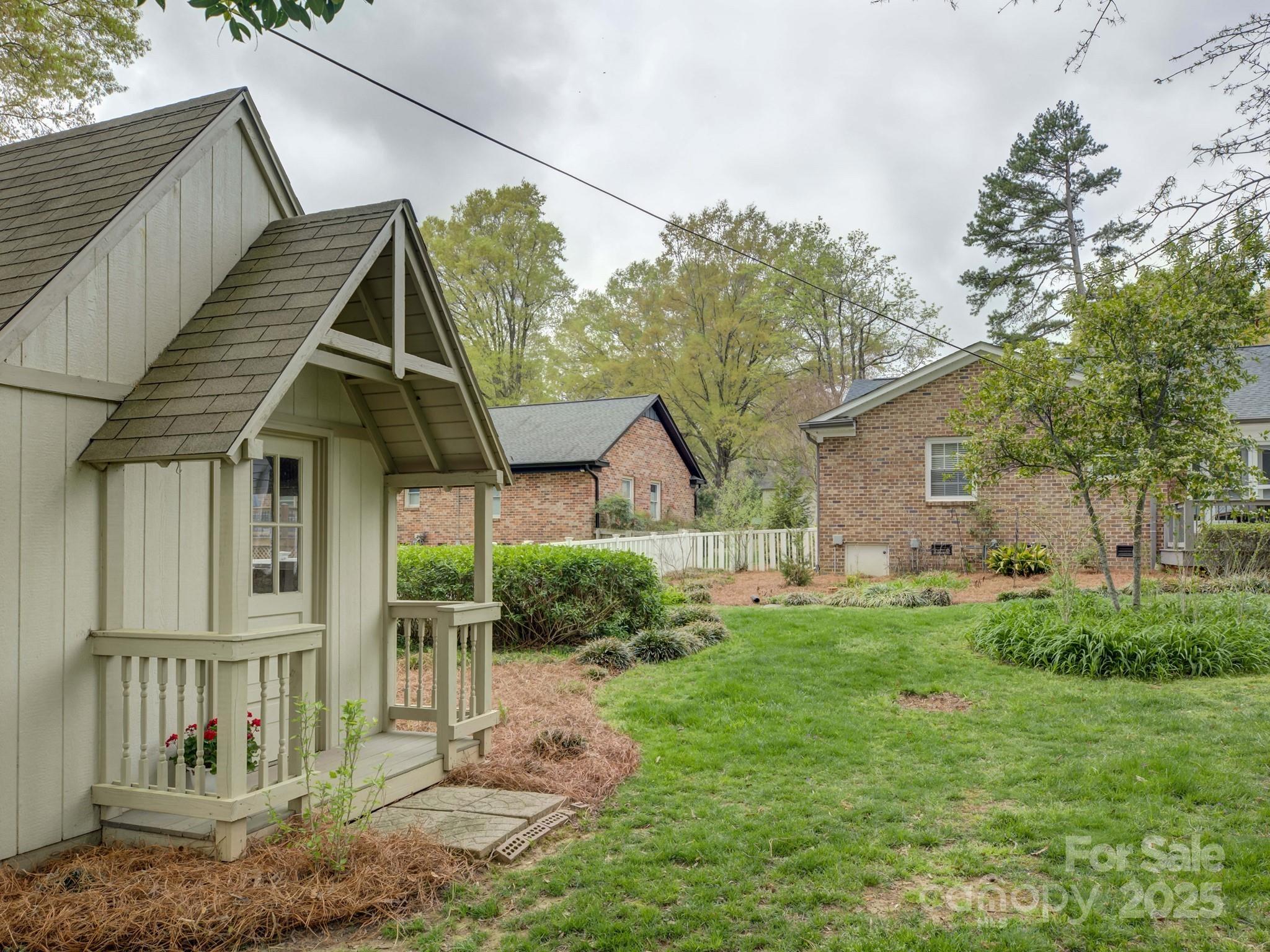 1340 Braeburn Road Charlotte, NC 28211 - Photo 40 of 46 a view of a house with a yard