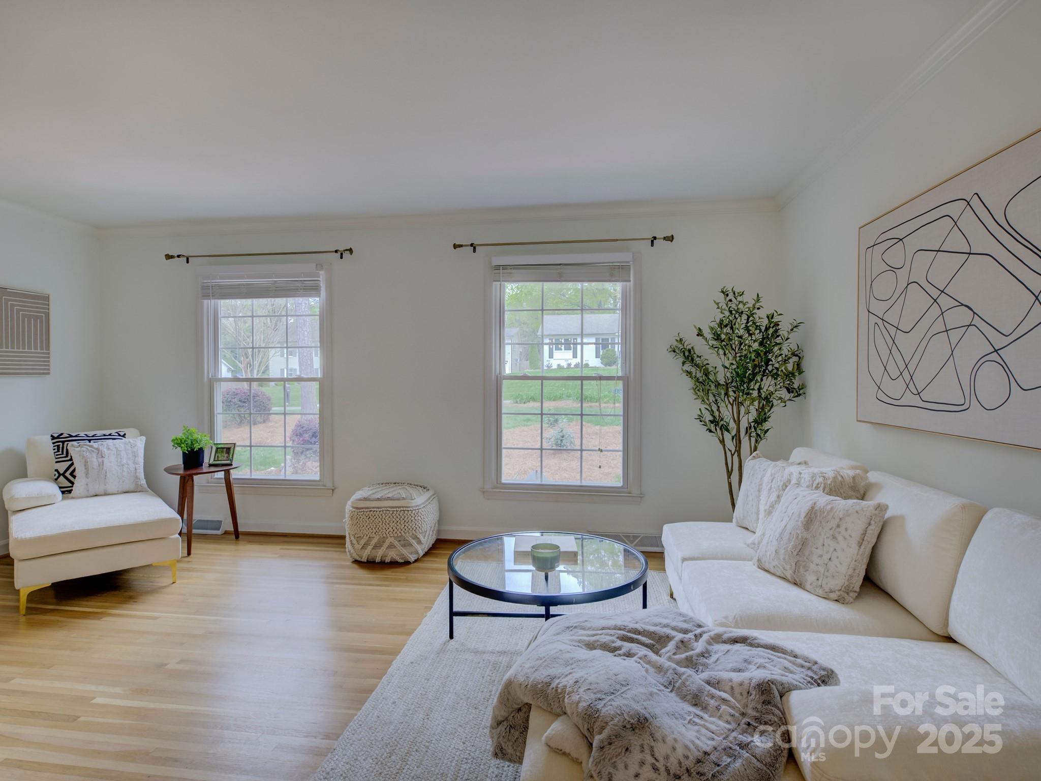 1340 Braeburn Road Charlotte, NC 28211 - Photo 7 of 46 a living room with furniture and window