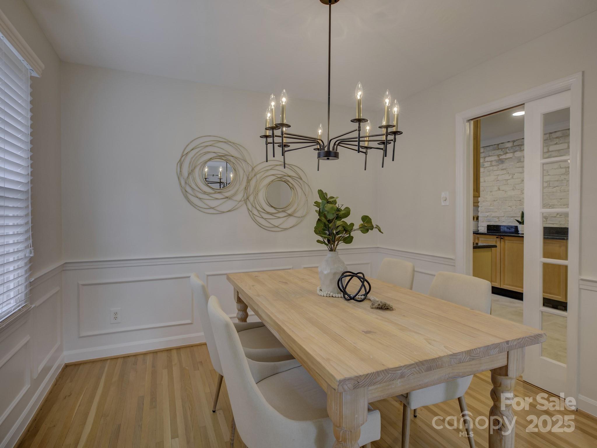 1340 Braeburn Road Charlotte, NC 28211 - Photo 9 of 46 a view of a table and chairs in the room