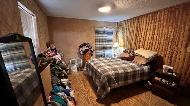 a view of a livingroom with furniture and closet