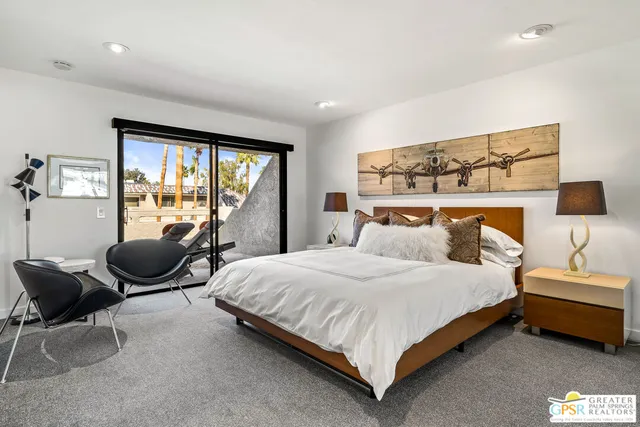 a bathroom with a double vanity sink toilet and shower