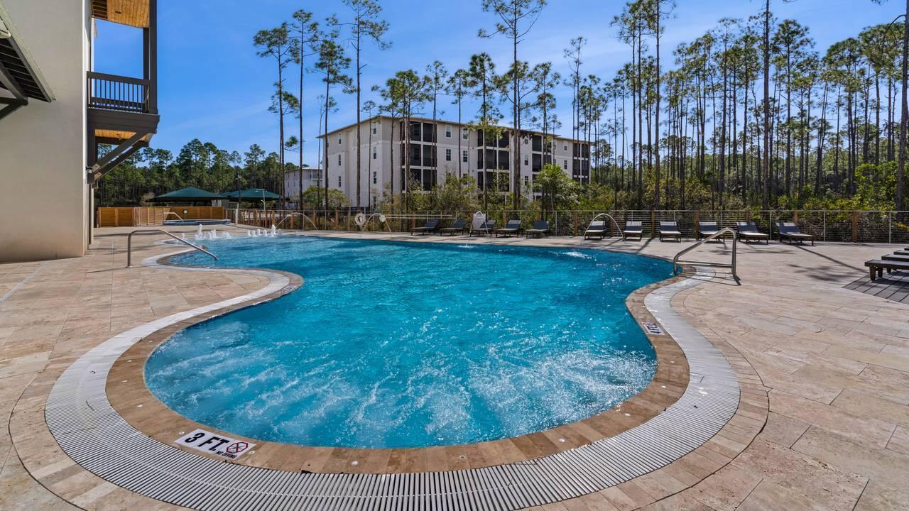 179 South County Highway 393, Unit 333 Santa Rosa Beach, FL 32459 - Photo 15 of 34 a view of a swimming pool with a patio