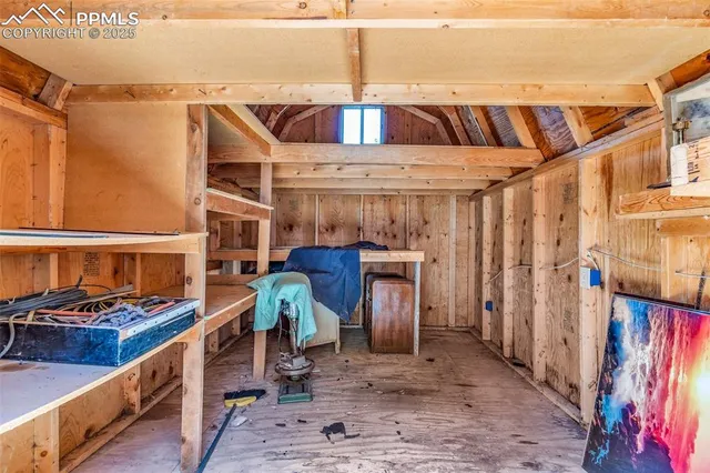 a front view of a house with a yard and a garage