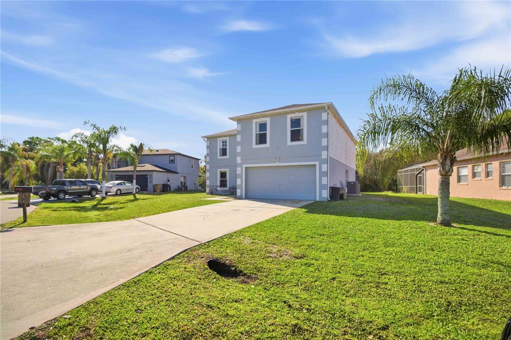 206 Taranto Way Kissimmee, FL 34758 - Photo 4 of 45 a house view with swimming pool in front of it