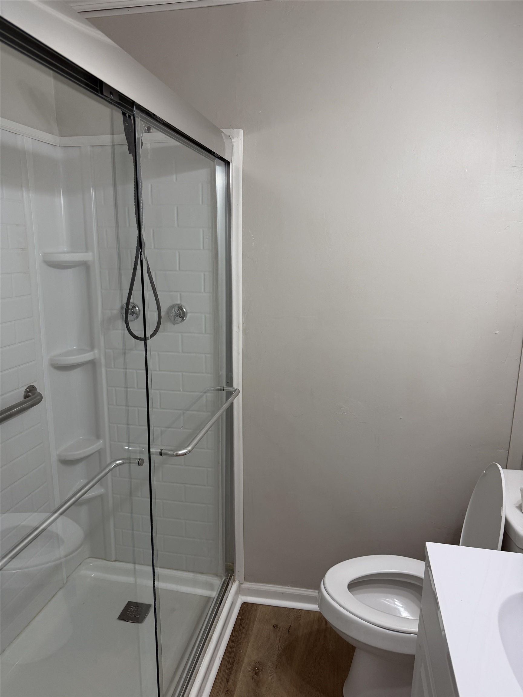 940 Old Lula Road Reagan, TN 38368 - Photo 17 of 39 a white toilet sitting next to a shower